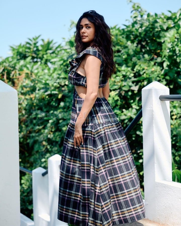 Actress Mrunal Thakur in a Cutout Check Maxi Dress Pictures 01