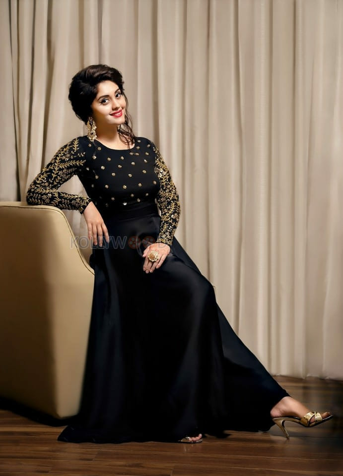 Actress Surbhi Black Dress Photoshoot Pictures