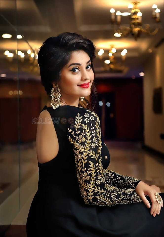 Actress Surbhi Black Dress Photoshoot Pictures