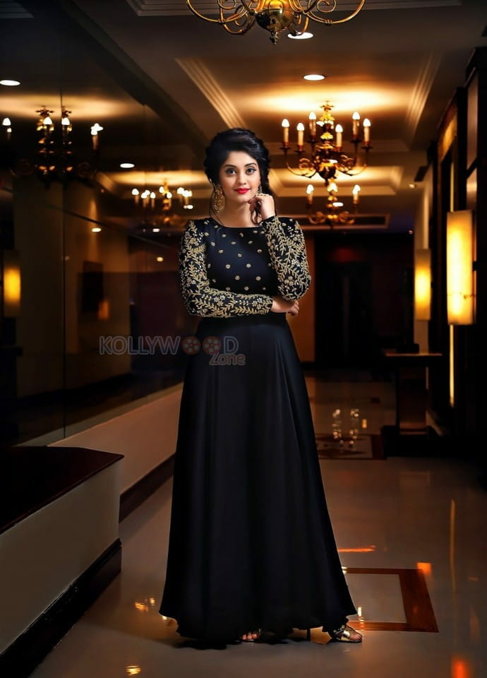 Actress Surbhi Black Dress Photoshoot Pictures