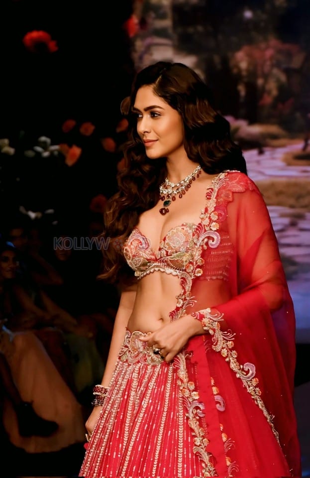 Attractive Mrunal Thakur in a Red Lehenga at Bombay Times Fashion Week Photos 03