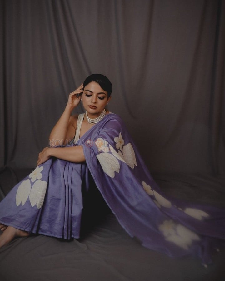 Beautiful Nikhila Vimal in a Floral Print Saree with a White Sleeveless Blouse Photos 04