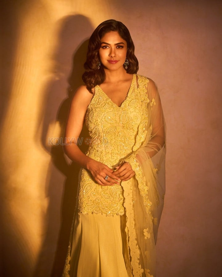 Beautifully Elegant Mrunal Thakur in a Yellow Sharara Set Photos 04