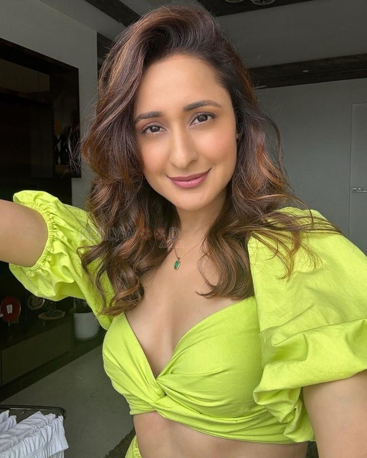 Bold Pragya Jaiswal in a Lime Green Crop Top and Mini Skirt Pictures 02