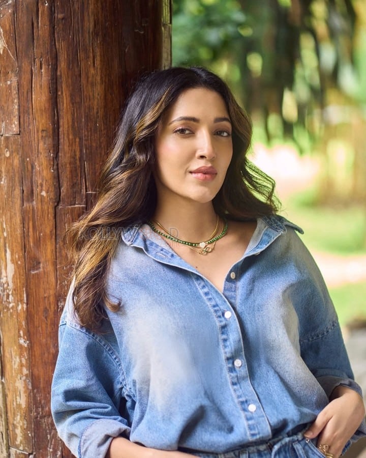 Casual Chic Neha Shetty in a Blue Denim Shirt Photos 01