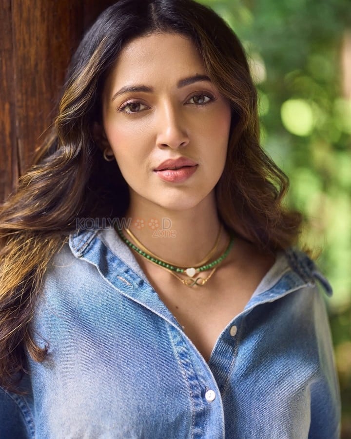 Casual Chic Neha Shetty in a Blue Denim Shirt Photos 03