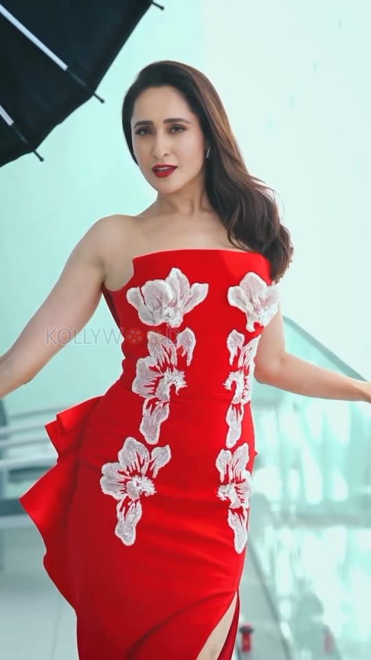 Dazzling Pragya Jaiswal in a Red Strapless Floral Gown Photos 03