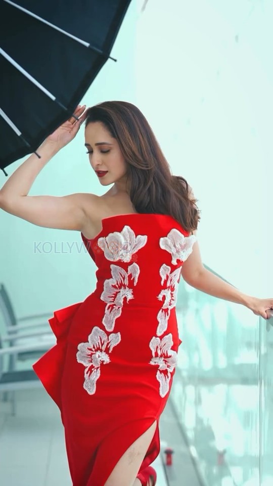 Dazzling Pragya Jaiswal in a Red Strapless Floral Gown Photos 05