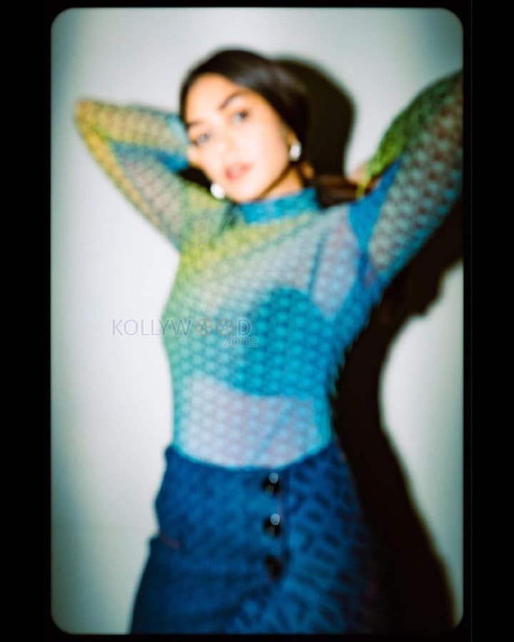 Glamorous Mrunal Thakur in a Blue Mesh Top with Matching Skirt Pictures 02