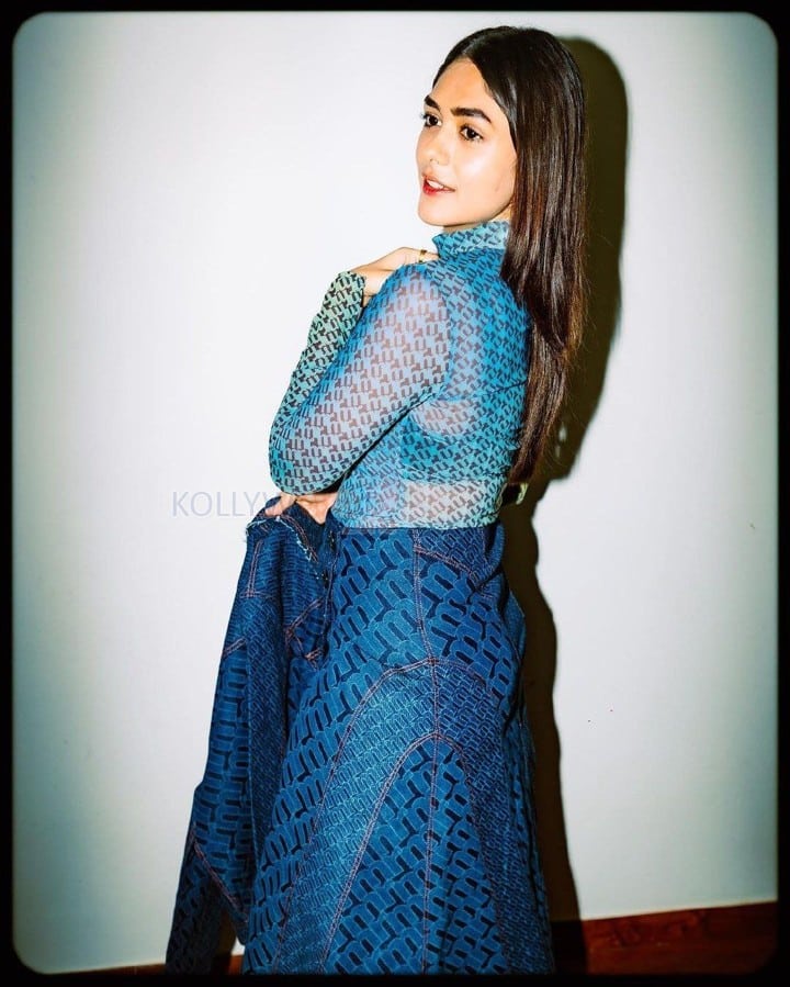 Glamorous Mrunal Thakur in a Blue Mesh Top with Matching Skirt Pictures 04