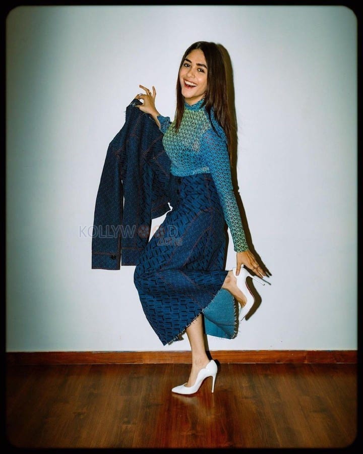 Glamorous Mrunal Thakur in a Blue Mesh Top with Matching Skirt Pictures 09