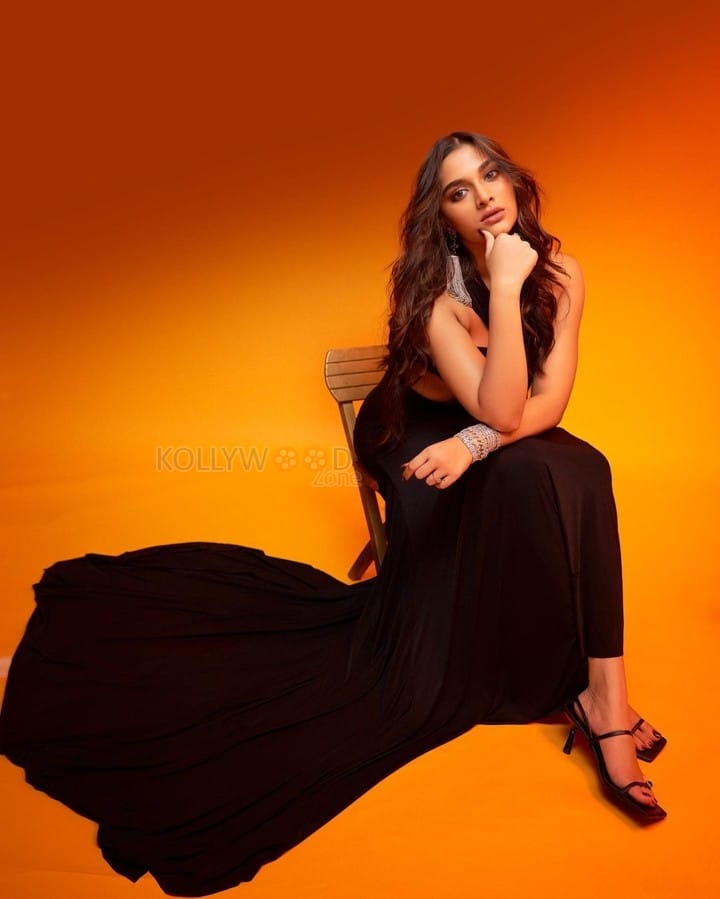 Gorgeous Saiee Manjrekar in a Black Sleeveless Maxi Dress Pictures 04