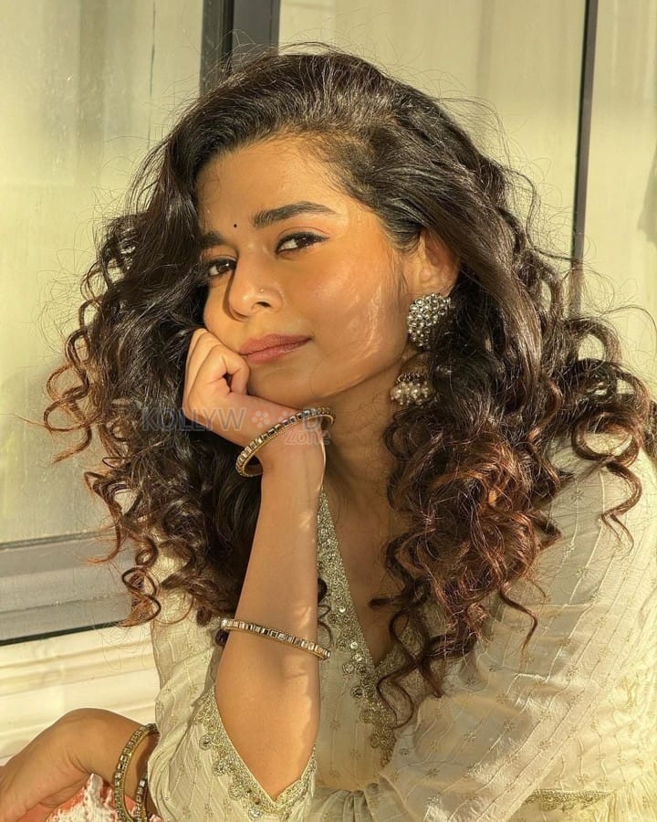 Pretty Mithila Palkar in a White Anarkali Dress Photos 01