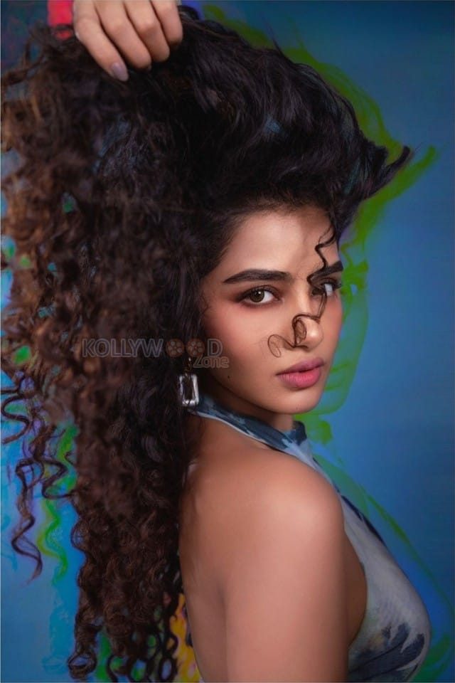 Stunning Anupama Parameswaran in a Sleeveless Backless Mini Bodycon Dress with a Halter Neckline Photos 01