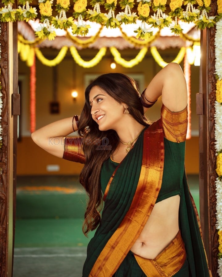 Stunning Rashi Singh in a Green and Orange Silk Half Saree Photos 03