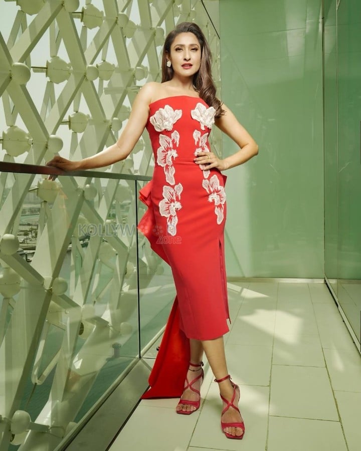 Stylish Pragya Jaiswal in a Red Bodycon Dress Stills 01