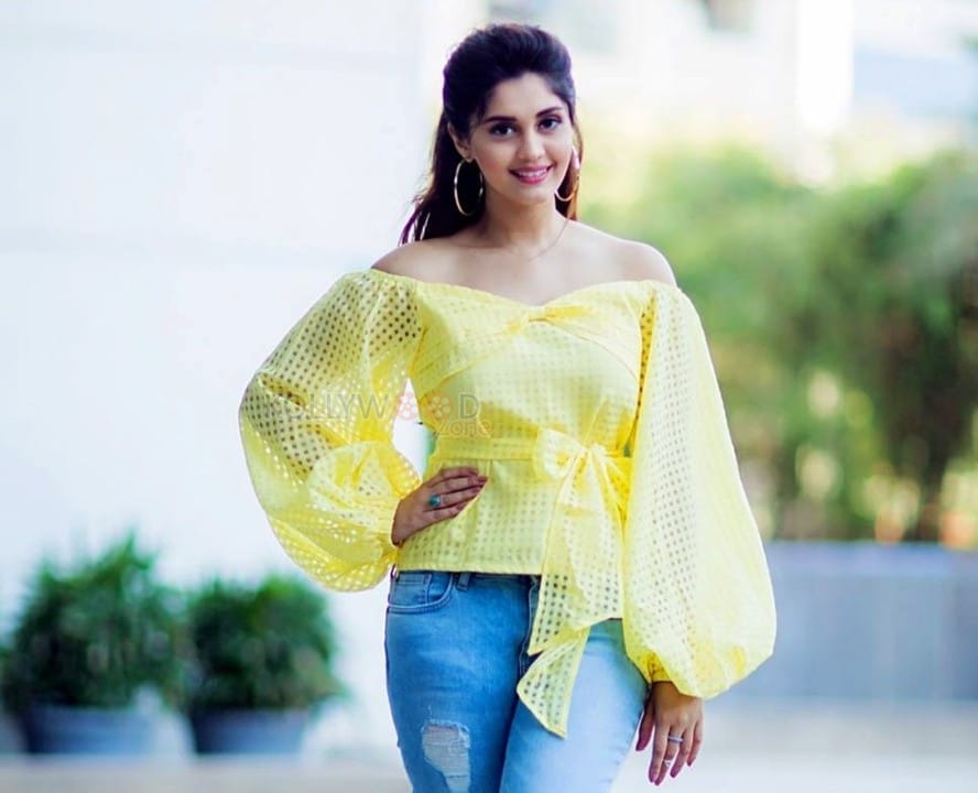 Telugu Actress Surbhi Yellow Top Blue Jeans Photos