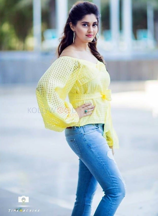 Telugu Actress Surbhi Yellow Top Blue Jeans Photos