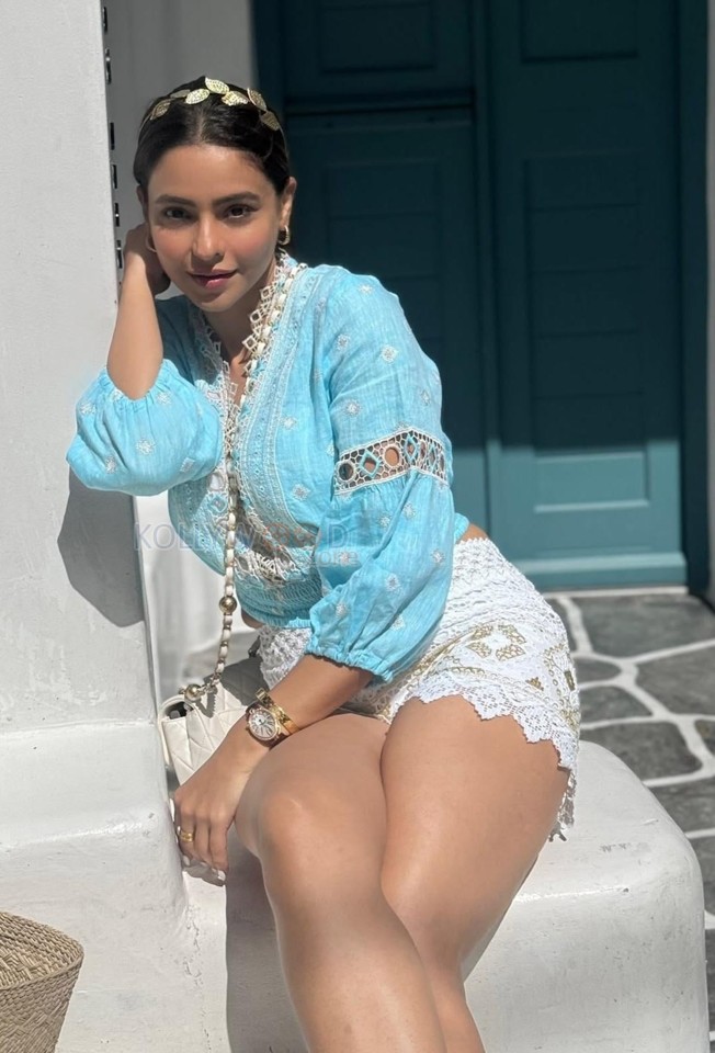 Aamna Sharif in a Powder Blue Top and Lace Shorts Photos 01