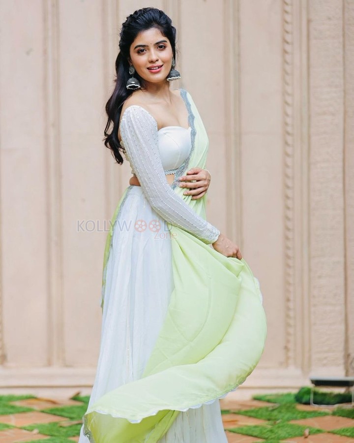 Beautiful Actress Amritha Aiyer in a Chic Green Dress Photos 01