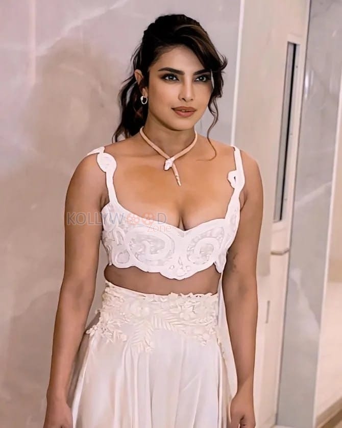 Bold Priyanka Chopra in a Plunging White Crochet Bralette Top with Matching Satin Pants Photos 02