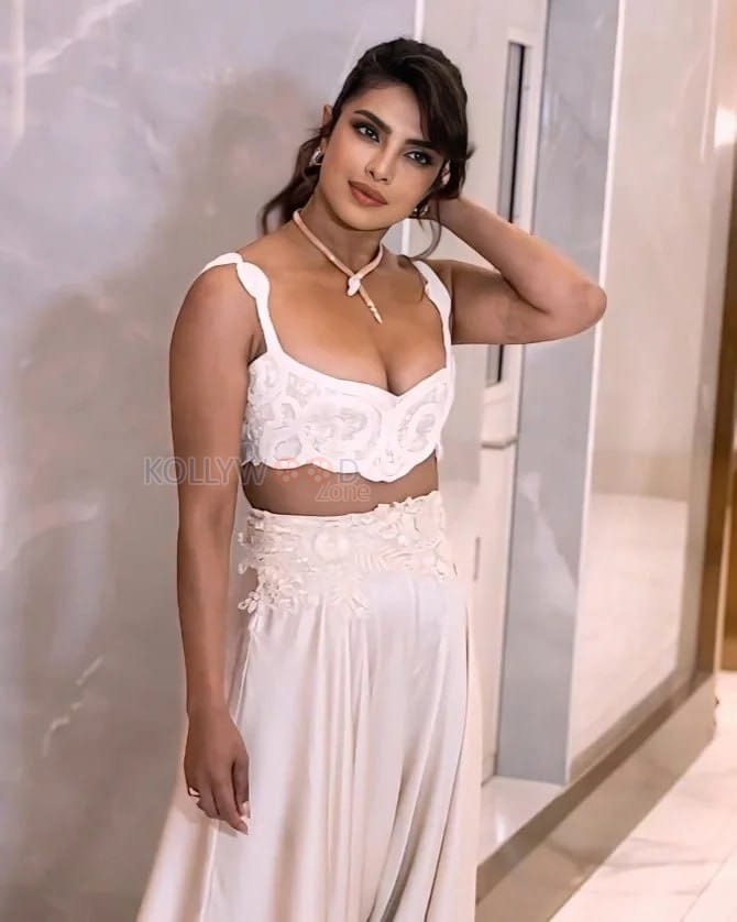 Bold Priyanka Chopra in a Plunging White Crochet Bralette Top with Matching Satin Pants Photos 03