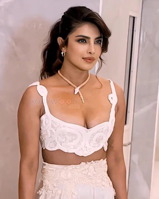 Bold Priyanka Chopra in a Plunging White Crochet Bralette Top with Matching Satin Pants Photos 05