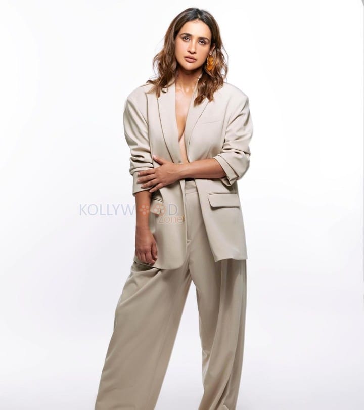 Sexy Aisha Sharma Topless in a Gray Suit Pictures 04