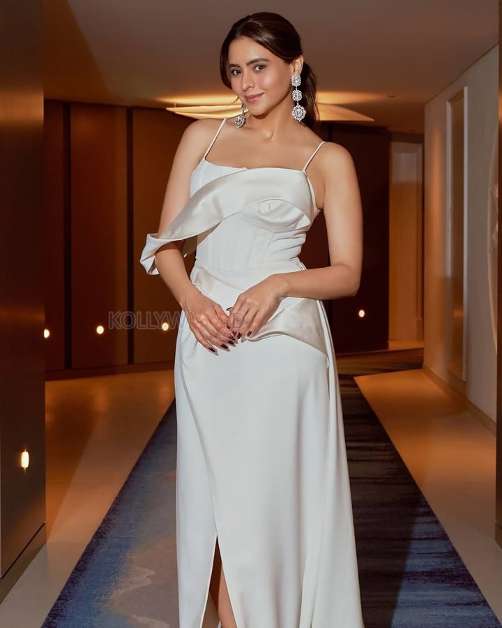 Stunning Aamna Sharif in a White Thigh Slit Maxi Dress Pictures 03