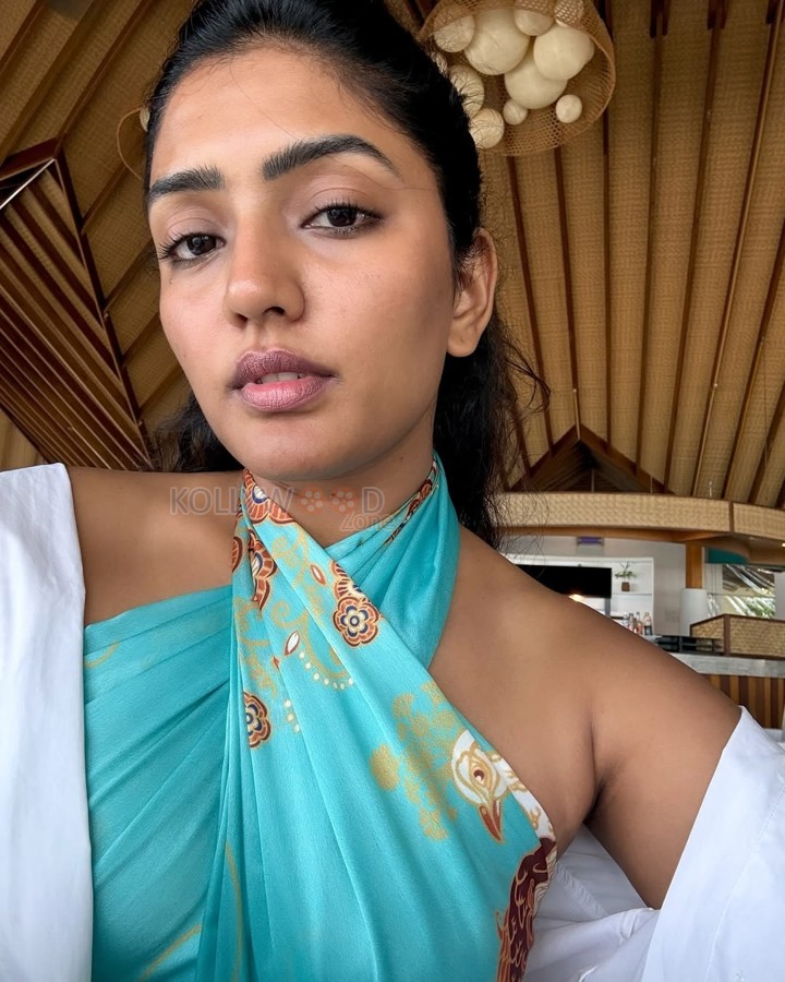 Stylish Eesha Rebba in a Teal Top with a White Pant Photos 01