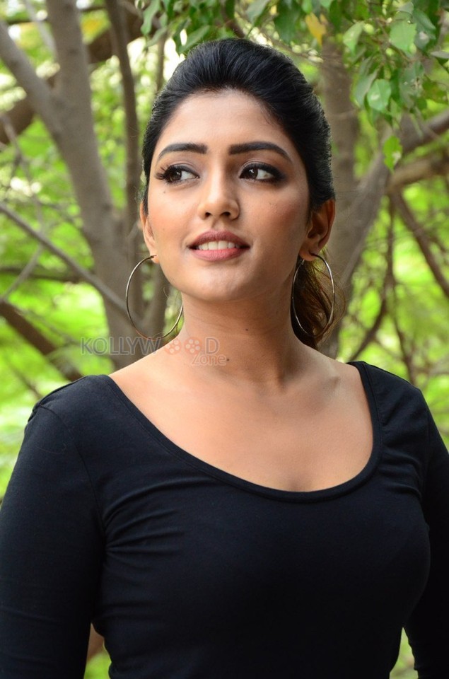 Tollywood Heroine Eesha Rebba in a Black Top Photos 11