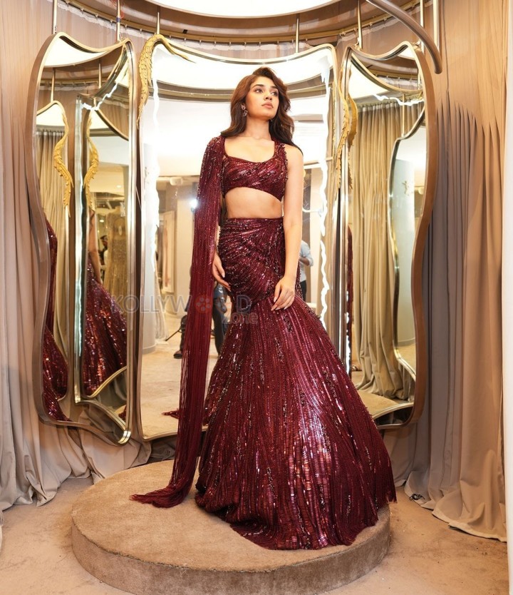 Dazzling Krithi Shetty in a Maroon Designer Lehenga Choli Photos 06