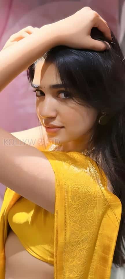 Krithi Shetty Cute in Yellow Photos 02