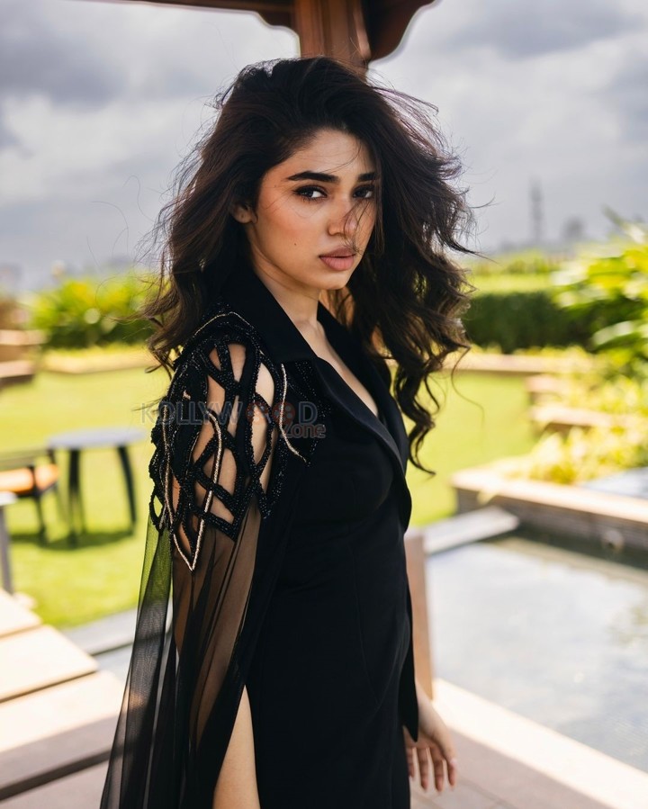 Lovely Beauty Krithi Shetty in a Black Jumpsuit Photos 02