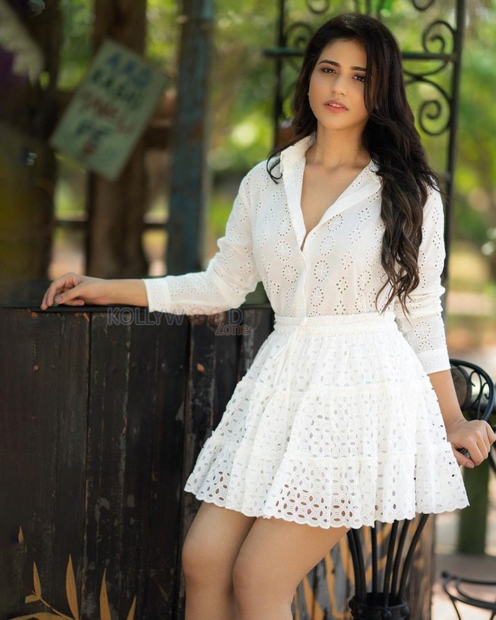 Sizzling Priyanka Jawalkar in a White Knitted Mini Dress Photos 04