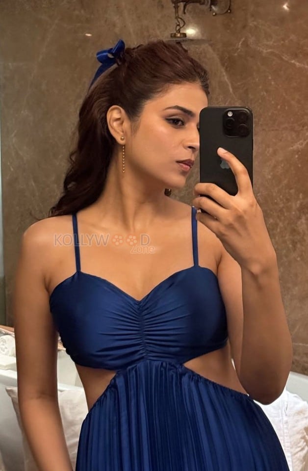 Charming Shraddha Das in a Blue Cut Out Dress Photos 03