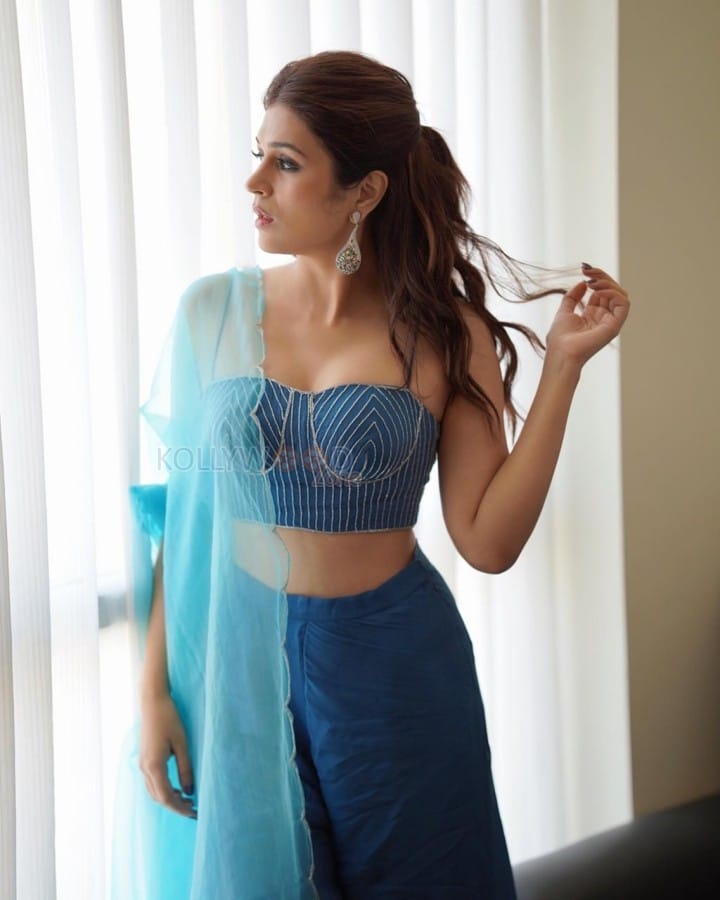 Elegant Shraddha Das in a Light Blue Lehenga Photos 03