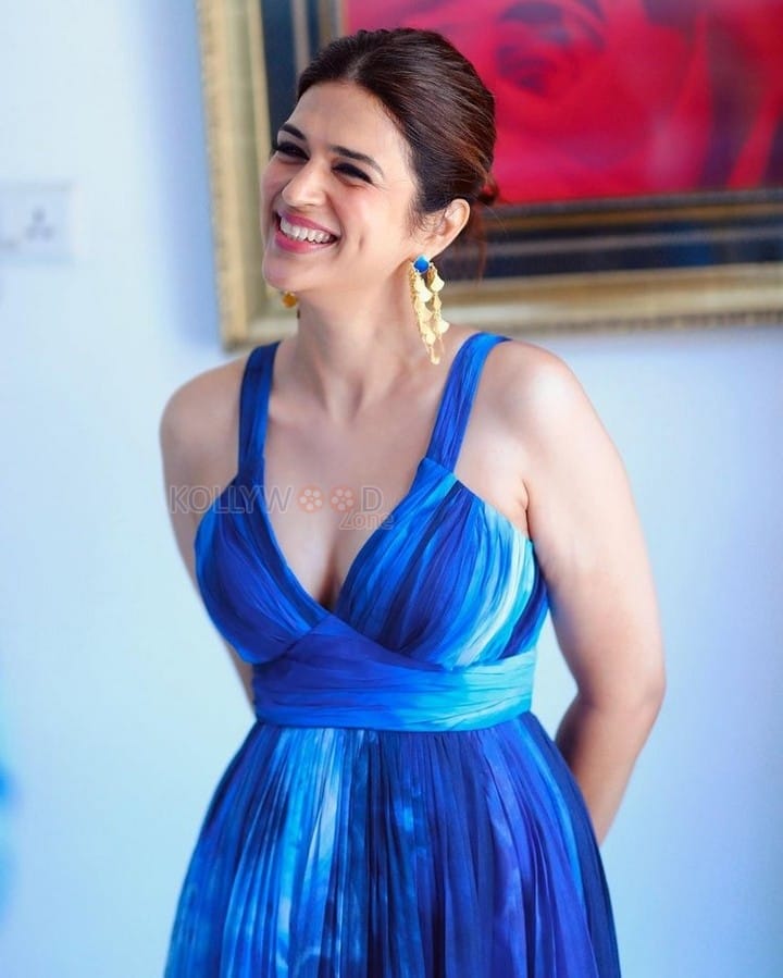 Ravishing Shraddha Das in a Backless Blue Maxi Dress Pictures 02