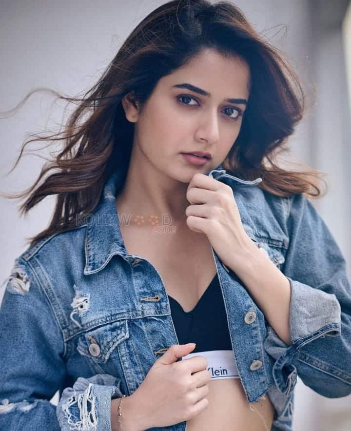 Sexy Ashika Ranganath in a Ripped Denim Jacket and Calvin Klein Bra Photos 02