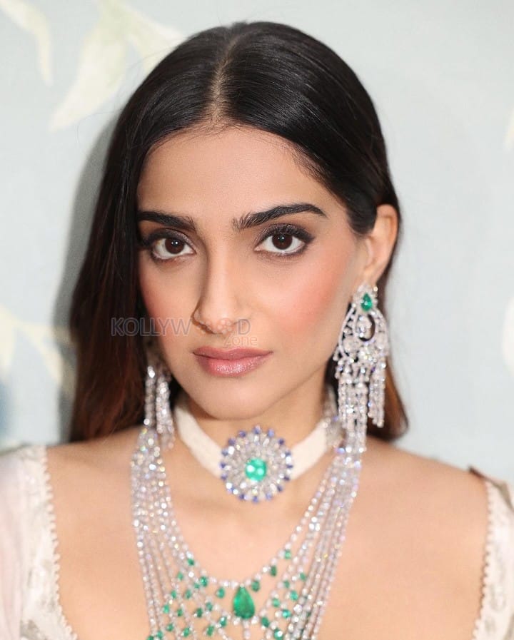 Stunning Sonam Kapoor in a White Anamika Khanna Lehenga at Anant Ambani Radhika Merchant Pre Wedding Bash Pictures 04