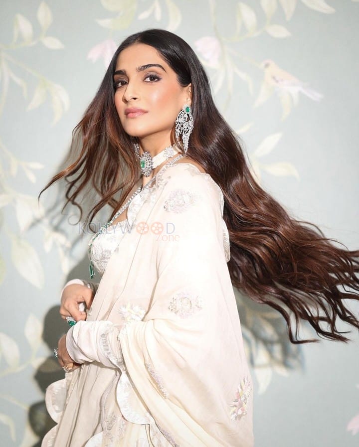 Stunning Sonam Kapoor in a White Anamika Khanna Lehenga at Anant Ambani Radhika Merchant Pre Wedding Bash Pictures 05