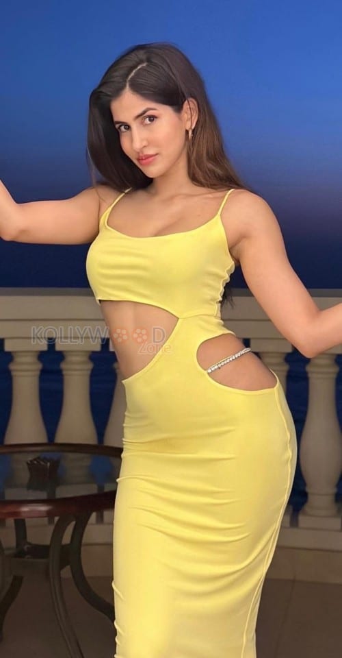 Sexy Sakshi Malik in a Lime Strappy Multi Waist Cut Out Midi Dress Photos 01