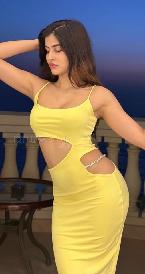 Sexy Sakshi Malik in a Lime Strappy Multi Waist Cut Out Midi Dress Photos 02