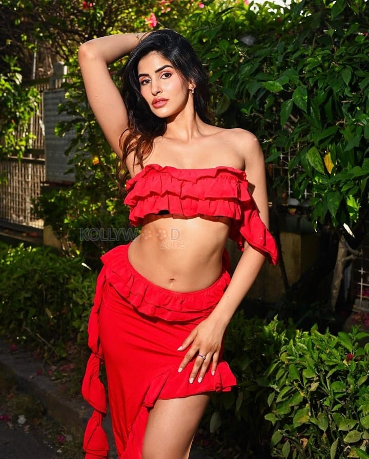 Stunning Bollywood Beauty Sakshi Malik in a Red Tube Style Bralette with Matching Skirt Photos 03