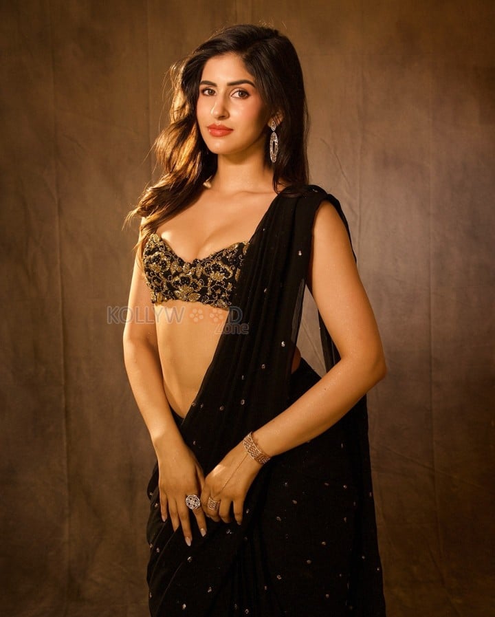 Stunning Sexy Sakshi Malik in a Black Printed Lehenga Pictures 05