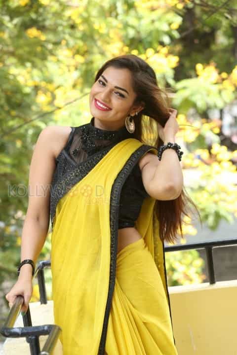 Actress Aswini Beautiful Yellow Saree Photos 13