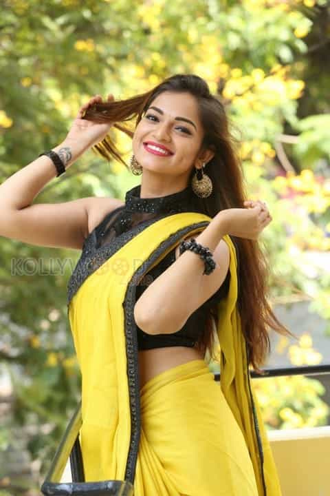 Actress Aswini Beautiful Yellow Saree Photos 14