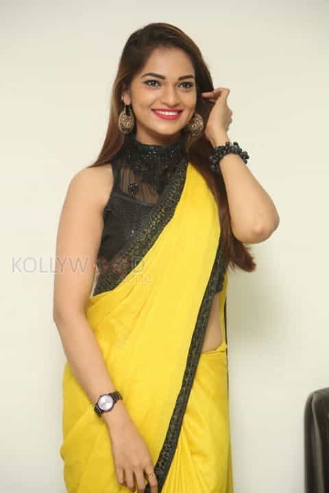 Actress Aswini Beautiful Yellow Saree Photos 38