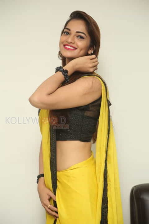 Actress Aswini Beautiful Yellow Saree Photos 39