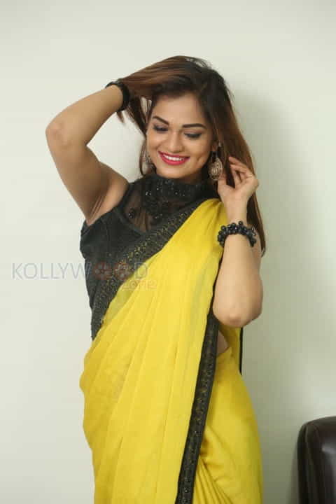 Actress Aswini Beautiful Yellow Saree Photos 49